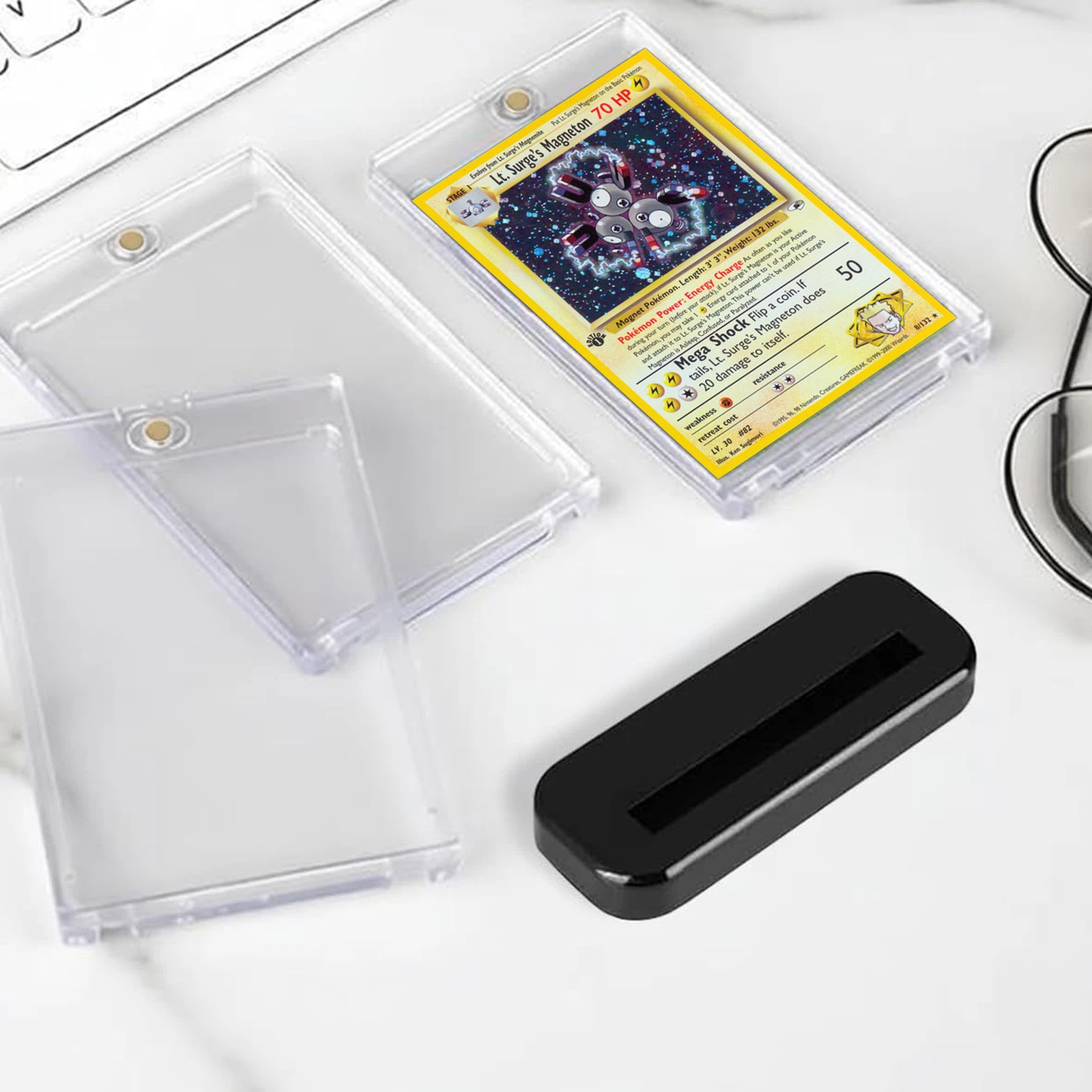 A Pokémon card in a clear magnetic case